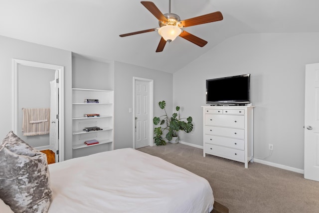 bedroom featuring carpet, vaulted ceiling, baseboards, and ceiling fan