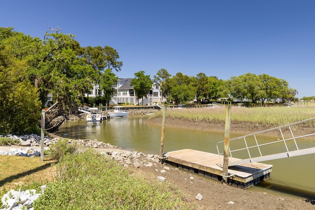 dock area with a water view