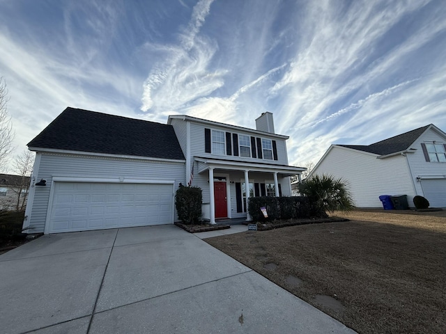 view of front facade featuring a garage and covered porch