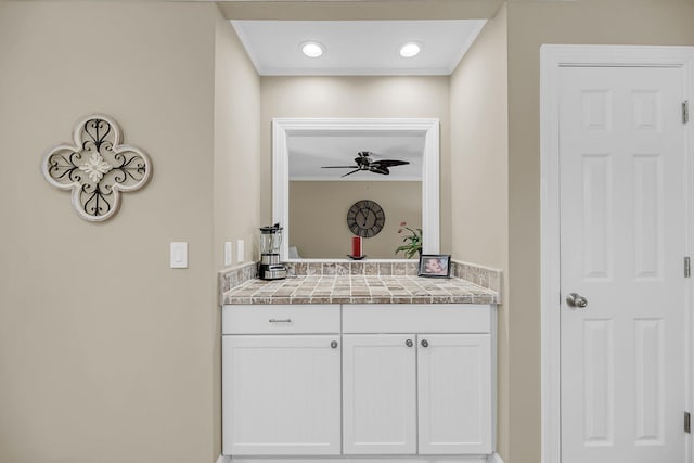 bathroom with ornamental molding, recessed lighting, and ceiling fan