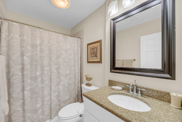 full bath with a shower with curtain, vanity, and toilet