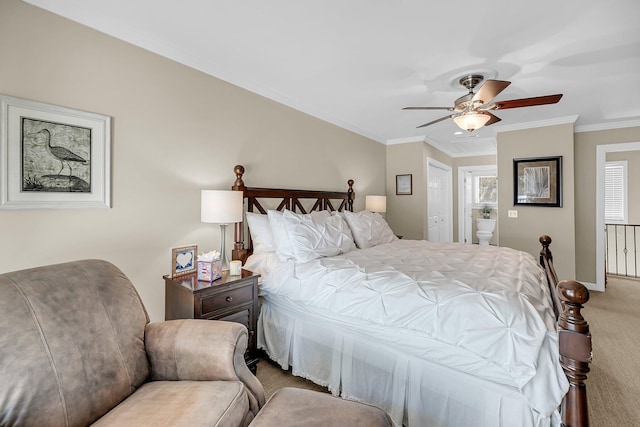 bedroom featuring ceiling fan, connected bathroom, baseboards, ornamental molding, and carpet