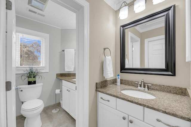 bathroom featuring toilet, visible vents, crown molding, and vanity