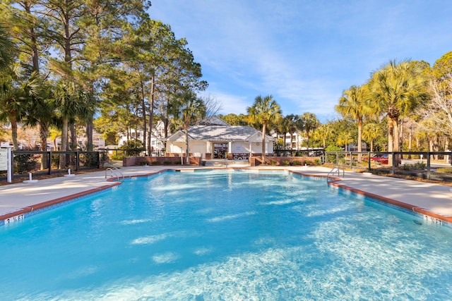 view of swimming pool with a patio