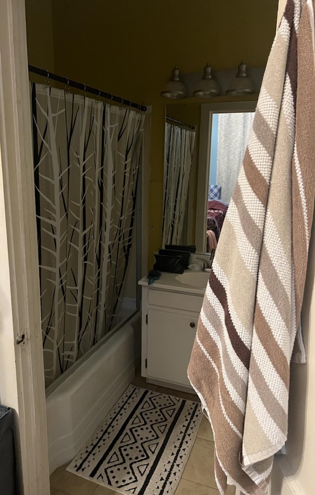 bathroom with vanity, tile patterned flooring, and shower / bathtub combination with curtain