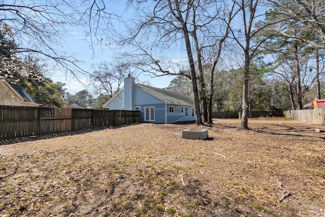 view of yard featuring a fenced backyard