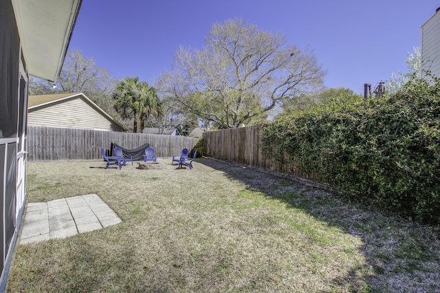 view of yard with a fenced backyard