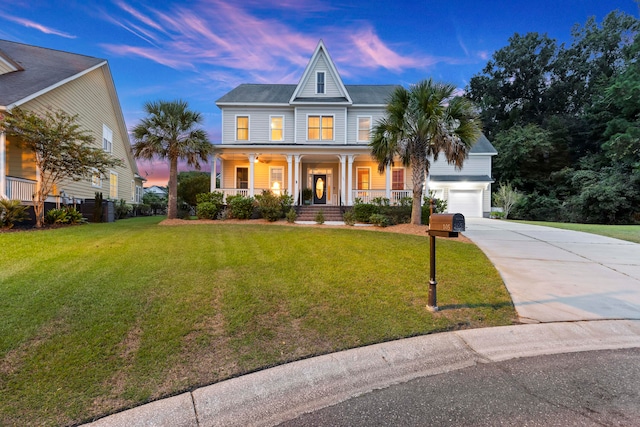 view of front facade featuring a lawn and covered porch