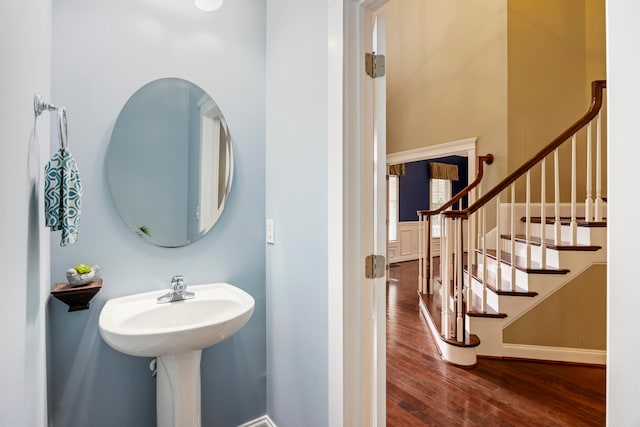 bathroom with wood-type flooring