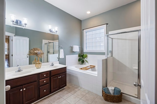 bathroom with vanity, independent shower and bath, and tile patterned floors