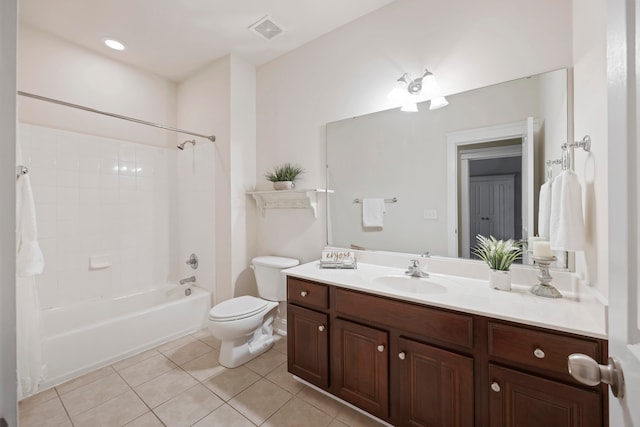 full bathroom with vanity, toilet, tile patterned flooring, and  shower combination