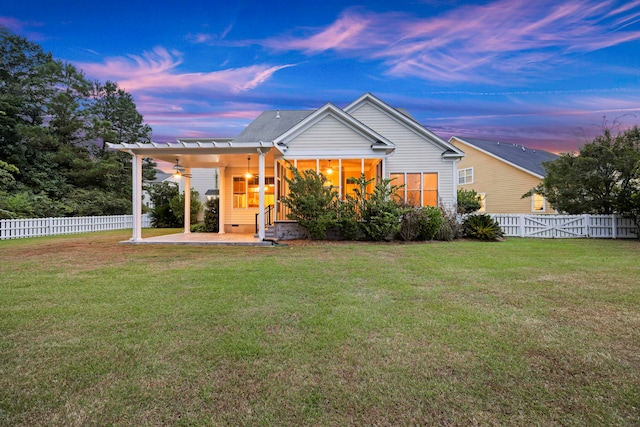 view of front of house with a lawn