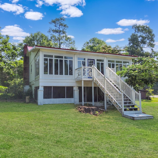 1201 Crescent St, Summerton, SC 29148 - rear view of house featuring a sunroom, stairway, a chimney, a yard, and a wooden deck