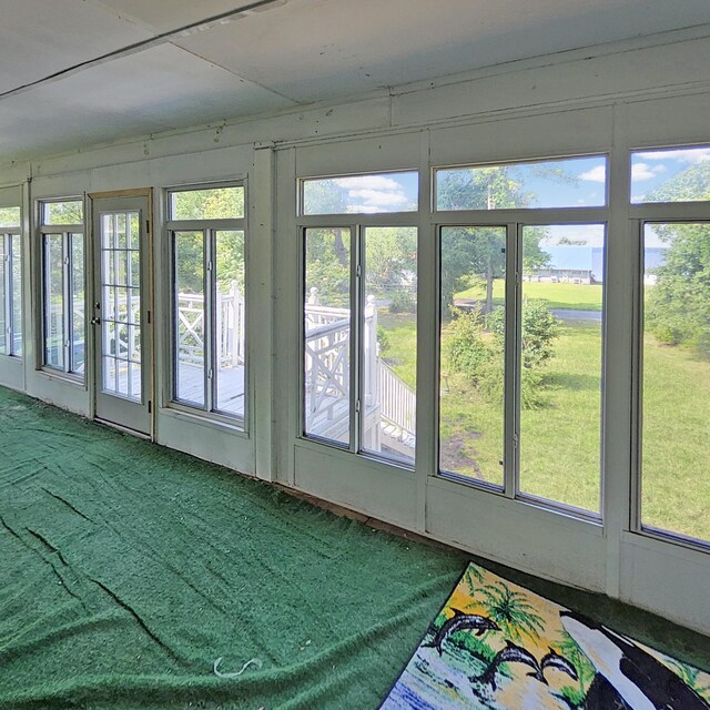 1201 Crescent St, Summerton, SC 29148 - unfurnished sunroom featuring healthy amount of natural light and carpet