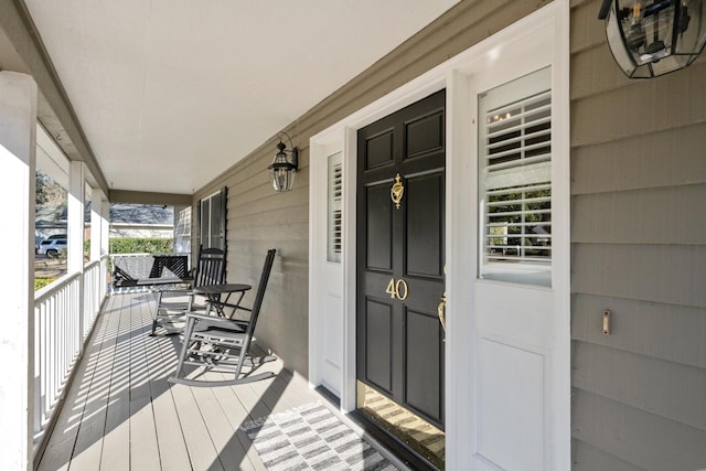 deck featuring covered porch