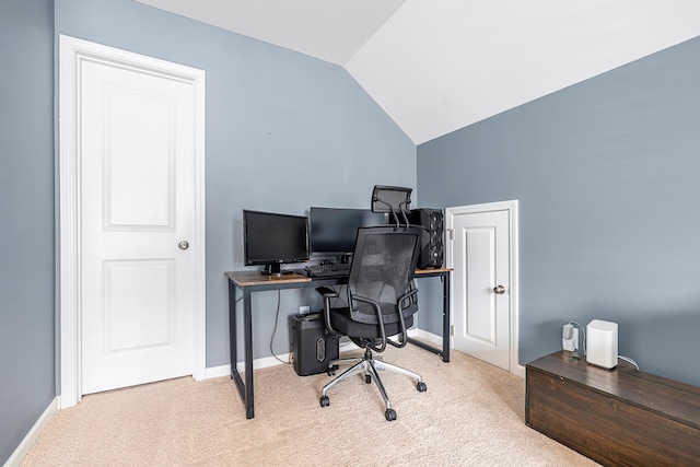 office with carpet floors, baseboards, and vaulted ceiling
