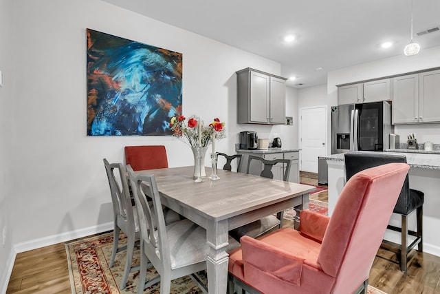 dining room featuring dark wood-type flooring