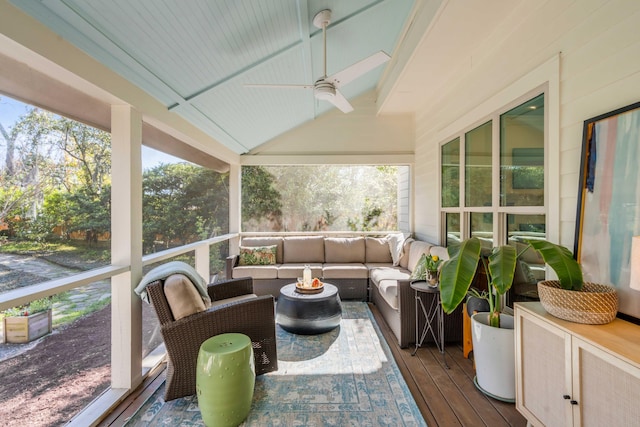 sunroom with ceiling fan and outdoor lounge area