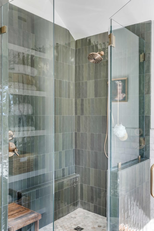bathroom with a stall shower