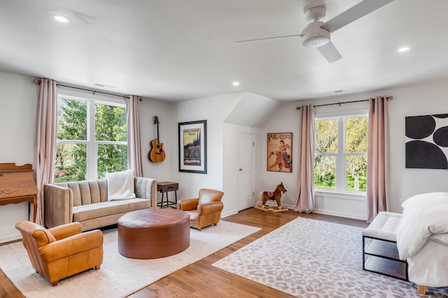 sitting room with plenty of natural light, a ceiling fan, wood finished floors, and recessed lighting