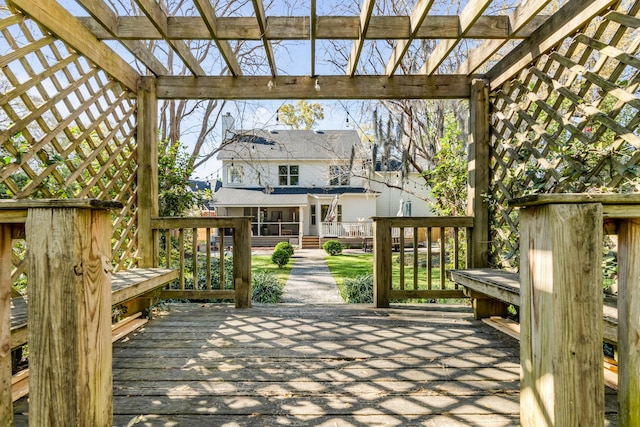 wooden terrace with a pergola