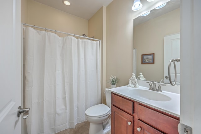 full bathroom with tile patterned flooring, a shower with shower curtain, vanity, and toilet