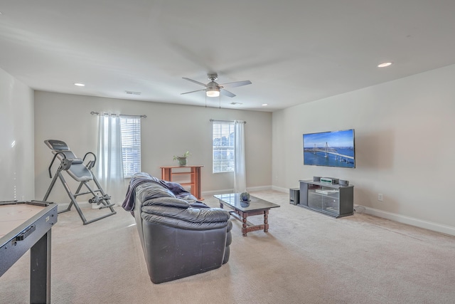 living room featuring ceiling fan, recessed lighting, carpet floors, visible vents, and baseboards