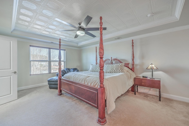 bedroom with light carpet, visible vents, and baseboards