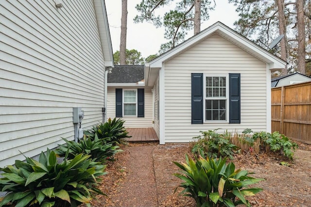 view of side of property with fence