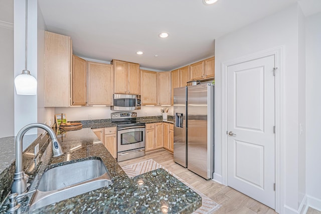 145 Pier View St Unit 214, Daniel Island, SC 29492 - kitchen featuring appliances with stainless steel finishes, a sink, light brown cabinetry, light wood-style flooring, and recessed lighting