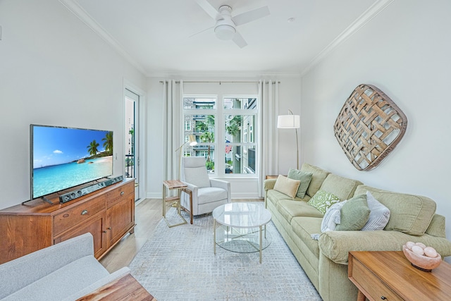 145 Pier View St Unit 214, Daniel Island, SC 29492 - living room featuring ornamental molding, light wood-style flooring, ceiling fan, and baseboards
