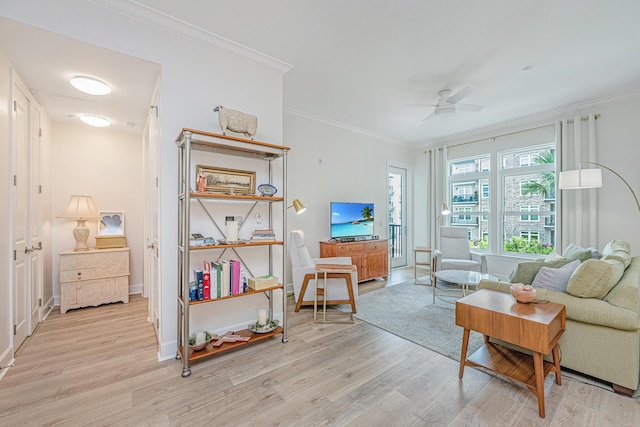 145 Pier View St Unit 214, Daniel Island, SC 29492 - living area with light wood-type flooring, ornamental molding, a ceiling fan, and baseboards