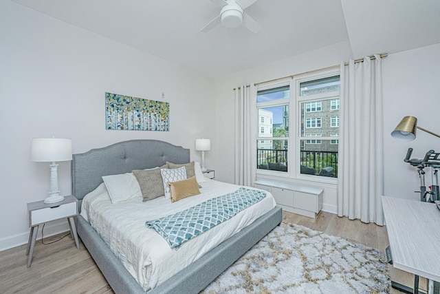 145 Pier View St Unit 214, Daniel Island, SC 29492 - bedroom with light wood-style floors, a ceiling fan, and baseboards
