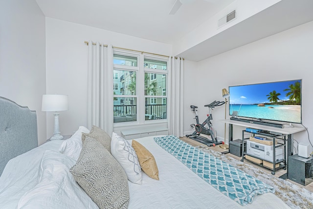 145 Pier View St Unit 214, Daniel Island, SC 29492 - bedroom with wood finished floors and a ceiling fan