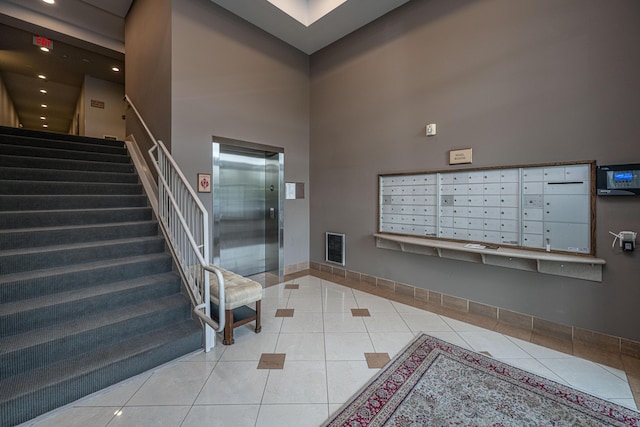 145 Pier View St Unit 214, Daniel Island, SC 29492 - lobby featuring a towering ceiling, stairway, and recessed lighting