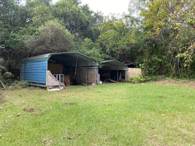 view of yard with a carport