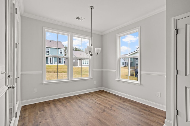 772 Opal Wing St, Moncks Corner, SC 29461 - unfurnished dining area with wood finished floors, ornamental molding, and baseboards