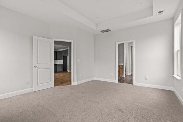 772 Opal Wing St, Moncks Corner, SC 29461 - unfurnished bedroom featuring carpet, baseboards, a raised ceiling, connected bathroom, and recessed lighting