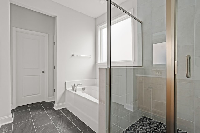 772 Opal Wing St, Moncks Corner, SC 29461 - bathroom featuring a bath, a stall shower, baseboards, and marble finish floors