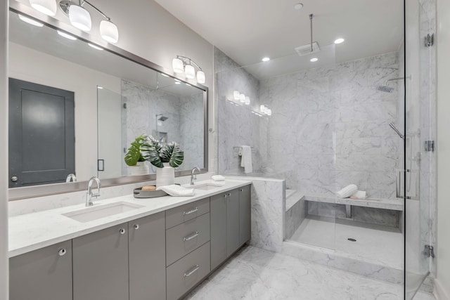 bathroom with vanity and shower with separate bathtub