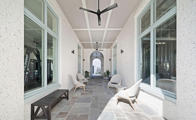 view of patio / terrace featuring ceiling fan