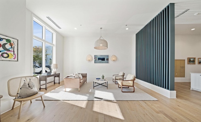 sitting room with light wood-type flooring