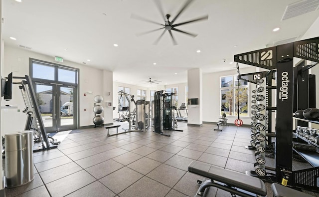 exercise room featuring french doors and ceiling fan