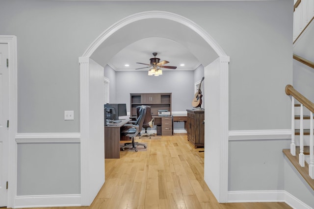 office featuring crown molding, ceiling fan, and light hardwood / wood-style floors