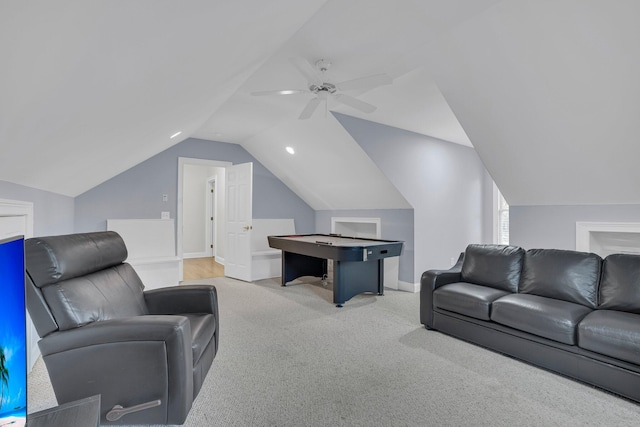 living room featuring light carpet, lofted ceiling, and ceiling fan