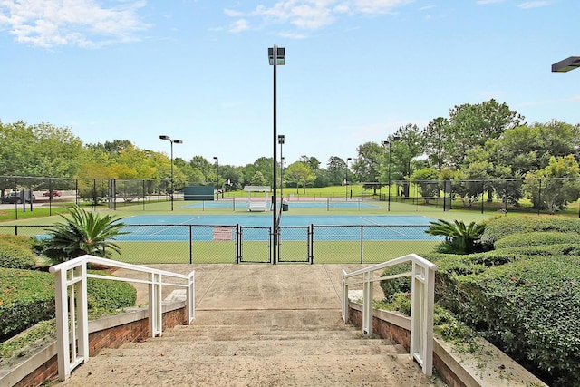 surrounding community featuring tennis court