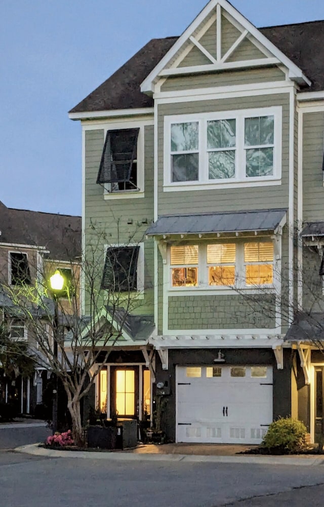 view of front of home with an attached garage