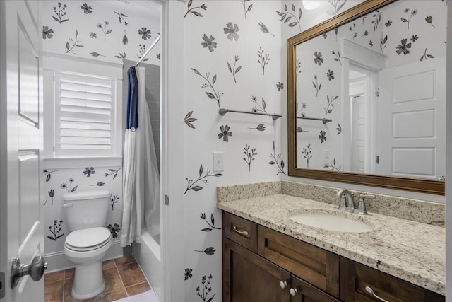 bathroom with tile patterned floors, toilet, vanity, and wallpapered walls