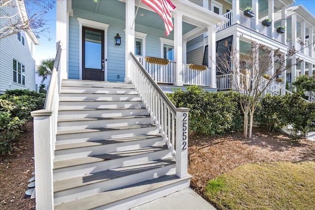 property entrance featuring a porch