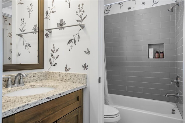 bathroom featuring shower / tub combo with curtain, toilet, and vanity